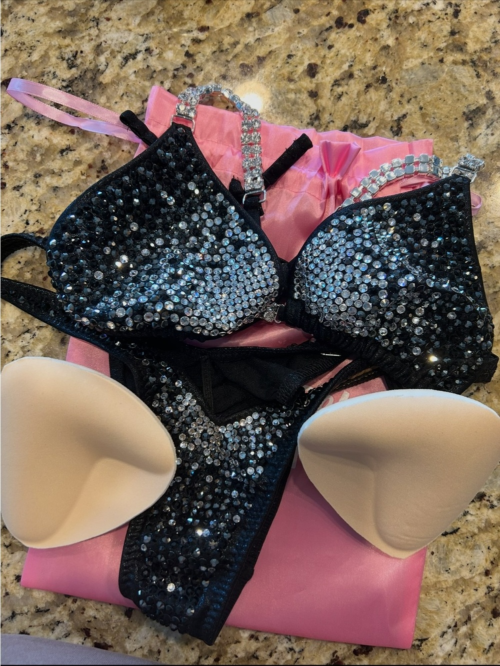Black and silver figure bodybuilding suit